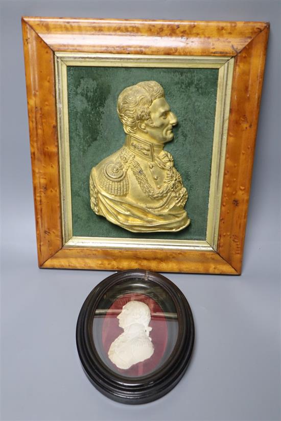 A maple framed ormolu relief of the Duke of Wellington and a plaster relief of Nelson, latter height 31cm overall